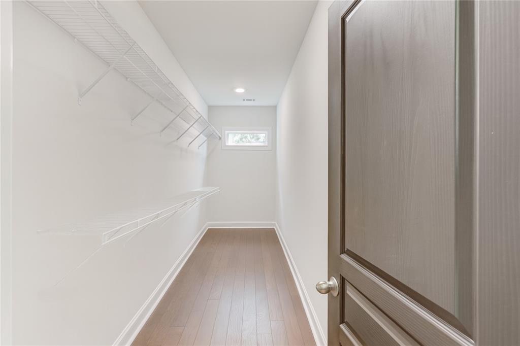 542 Flyingbolt Run Canton, GA 30115 - Photo 29 of 55 a view of a hallway