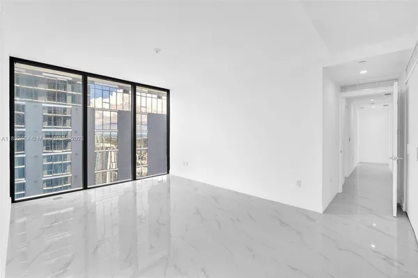 a view of room with walk in closet and stairs