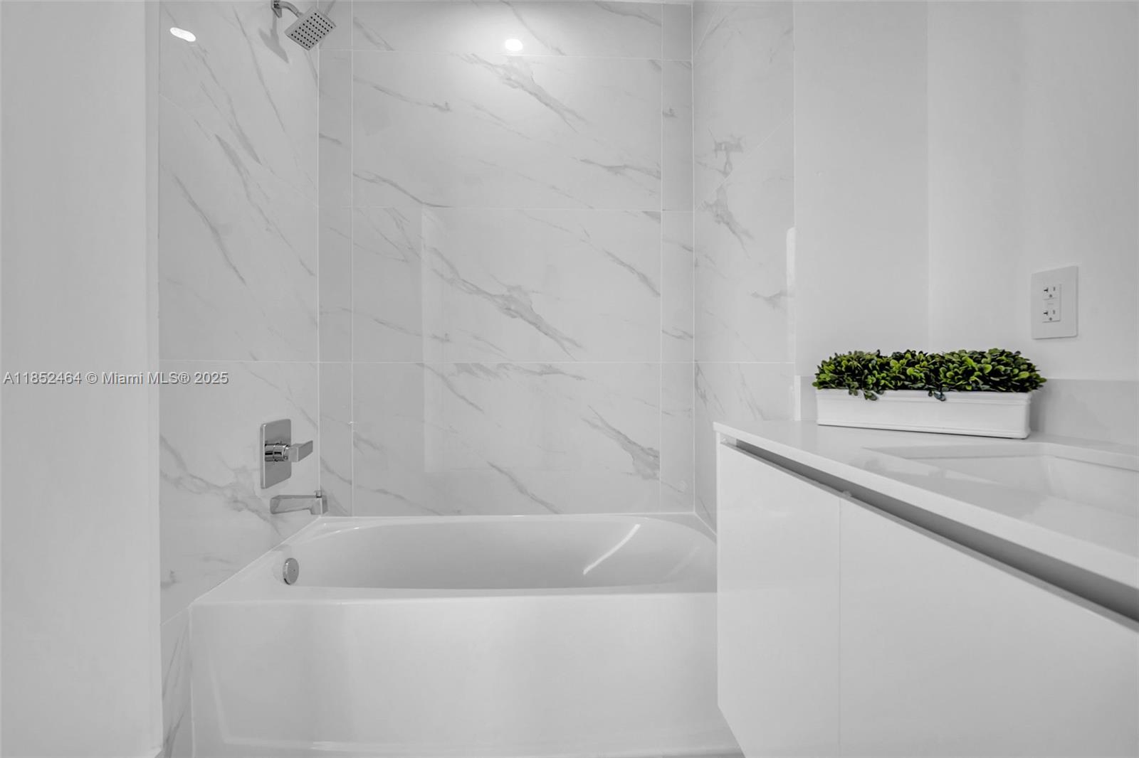 700 Northeast 24th Street, Unit 4507 Miami, FL 33137 - Photo 37 of 70 a bathroom with a bathtub