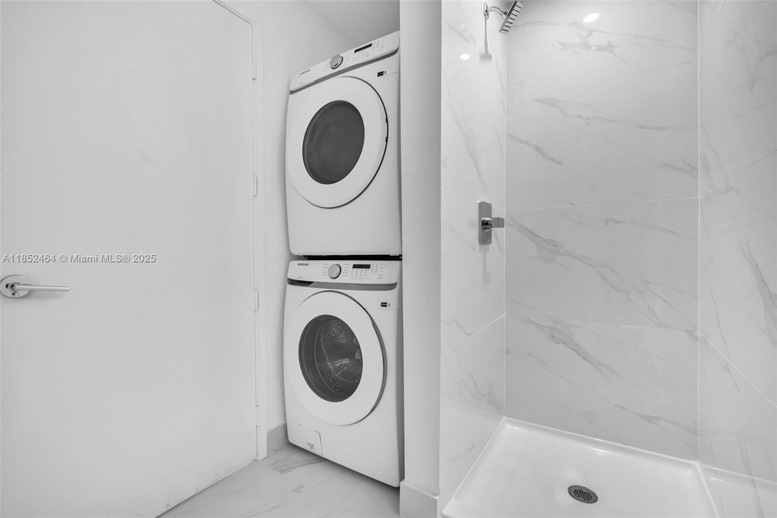 700 Northeast 24th Street, Unit 4507 Miami, FL 33137 - Photo 43 of 70 a utility room with dryer and washer