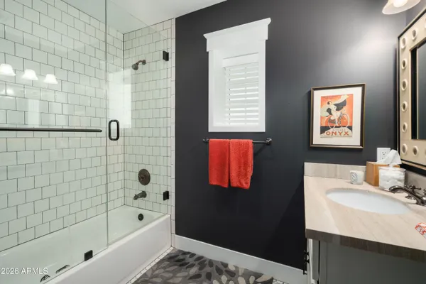 a bathroom with a sink and a bathtub