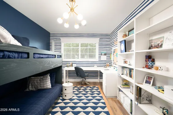 a kitchen with stainless steel appliances a stove and a refrigerator