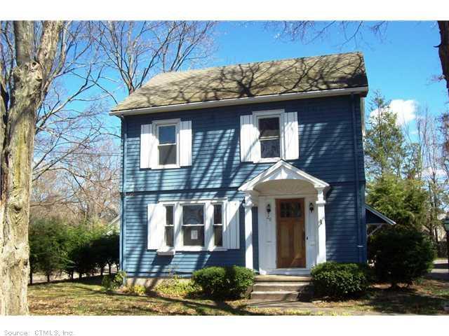 29 Phelps Road Manchester, CT 06042 - Photo 1 of 1 a front view of a house with garden