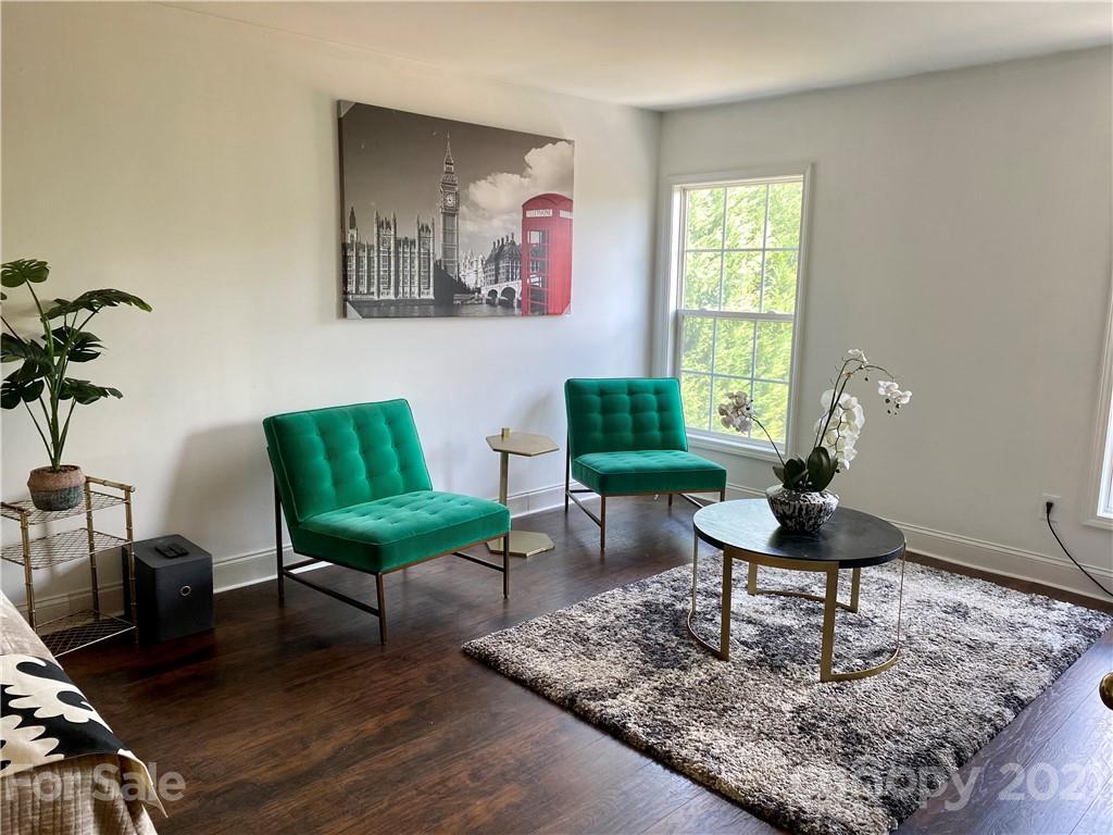 11414 Erwin Ridge Avenue Charlotte, NC 28213 - Photo 6 of 11 a living room with furniture and a potted plant