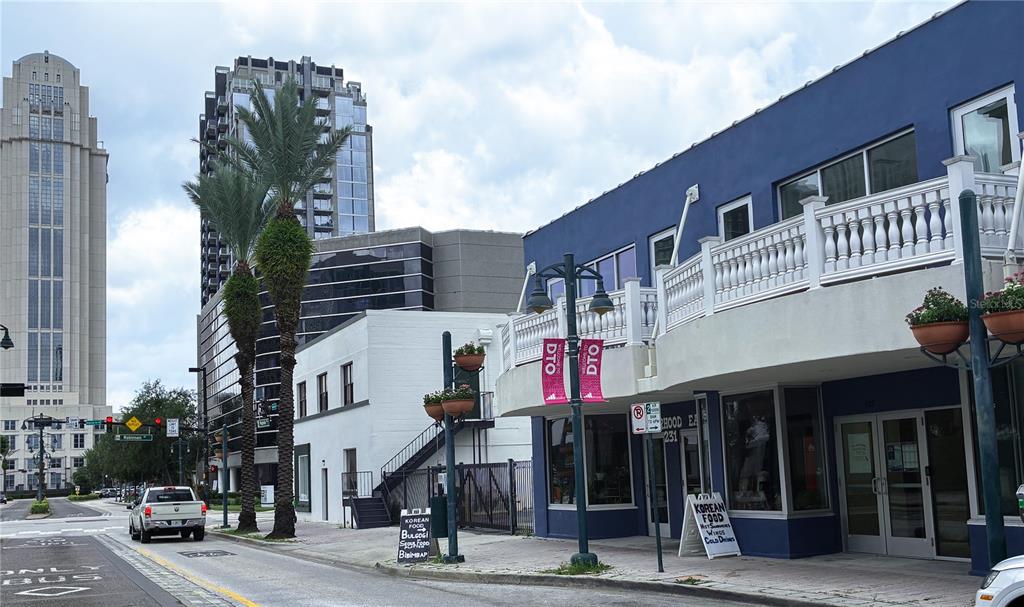 227 North Magnolia Avenue, Unit 202 Orlando, FL 32801 - Photo 2 of 6 a front view of a building with street view