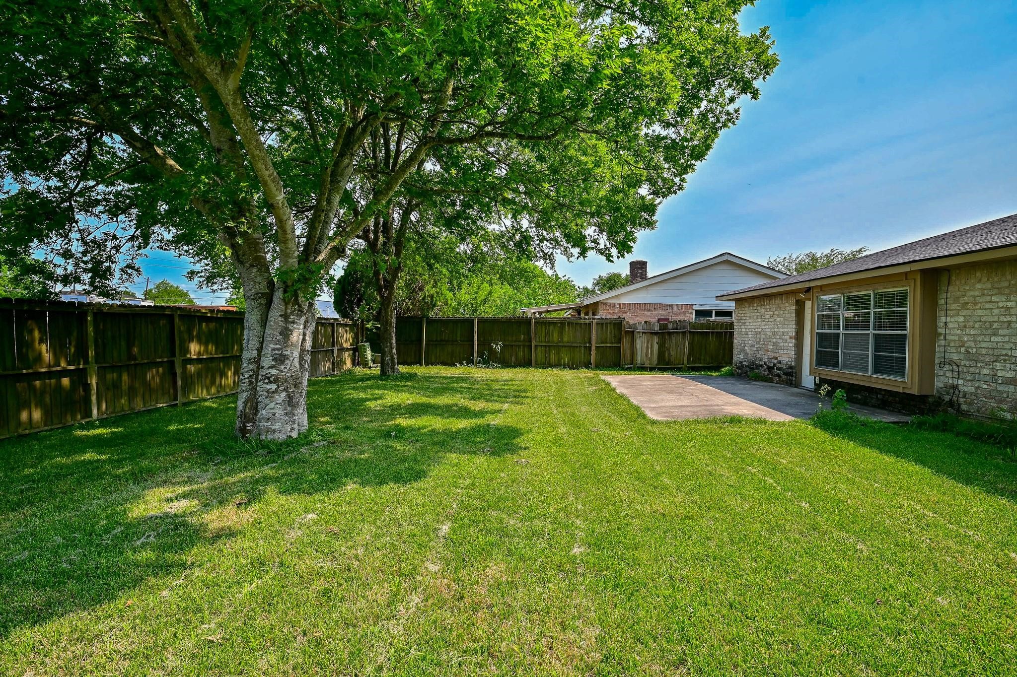 10019 Overview Drive Sugar Land, TX 77498 - Photo 30 of 30 a front view of a house with a garden