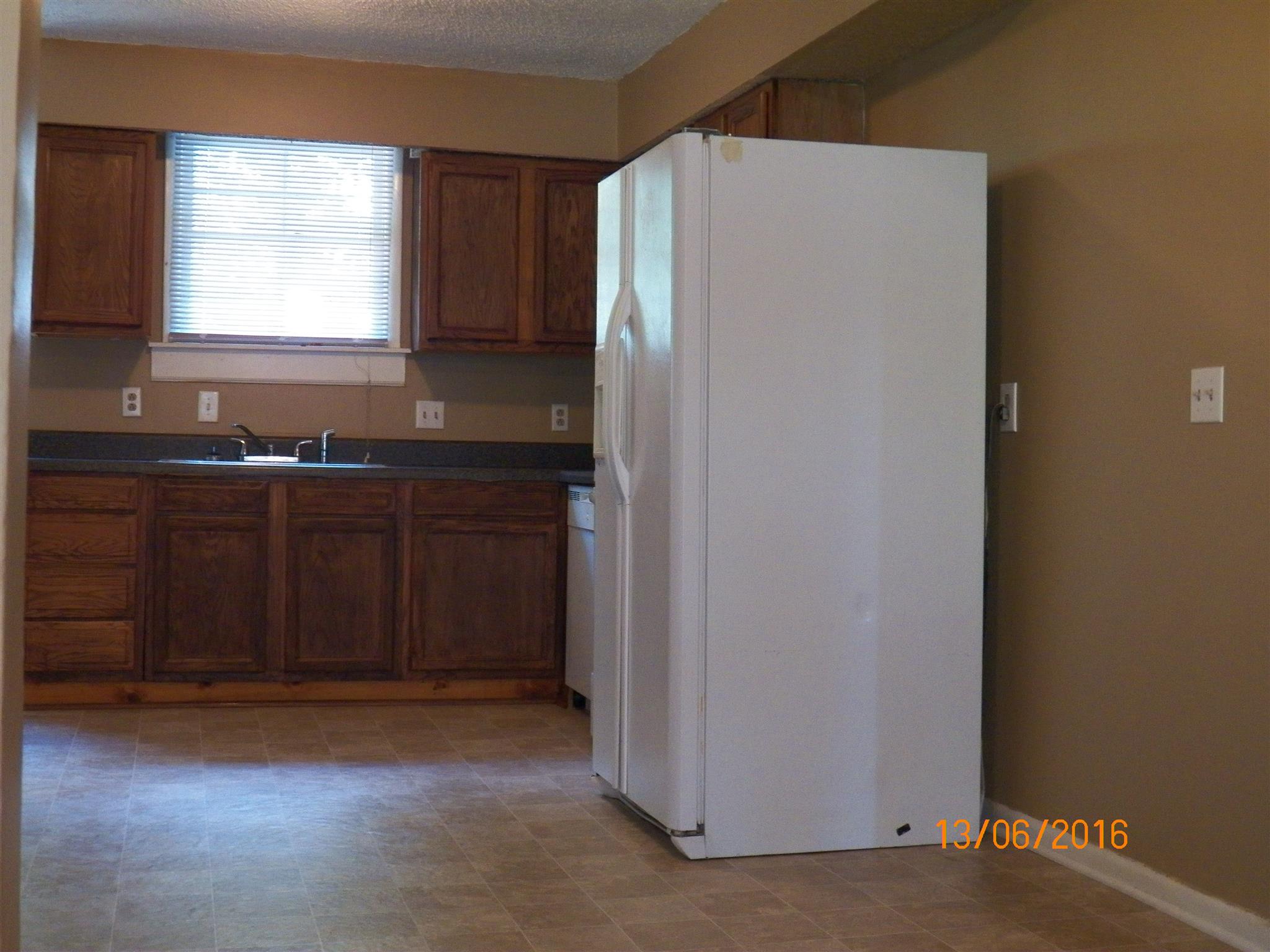 2901 Anderson Road Nashville, TN 37217 - Photo 4 of 20 a kitchen with a refrigerator and window
