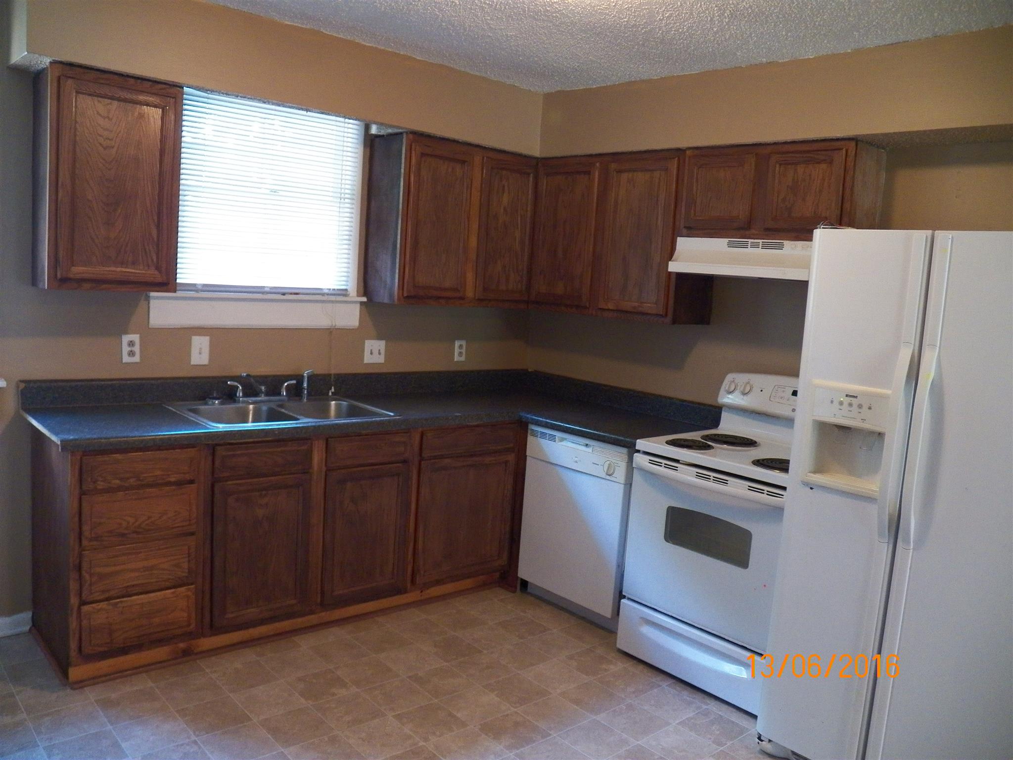 2901 Anderson Road Nashville, TN 37217 - Photo 5 of 20 a kitchen with sink a microwave and cabinets