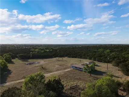a view of a street with a mountain