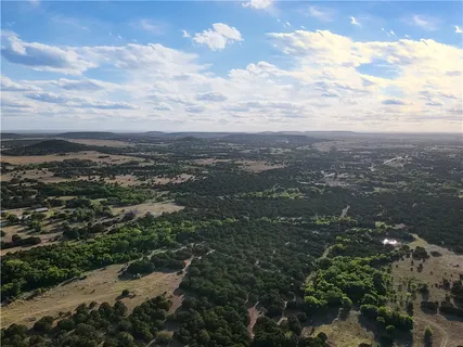 an aerial view of residential house with beach and ocean view