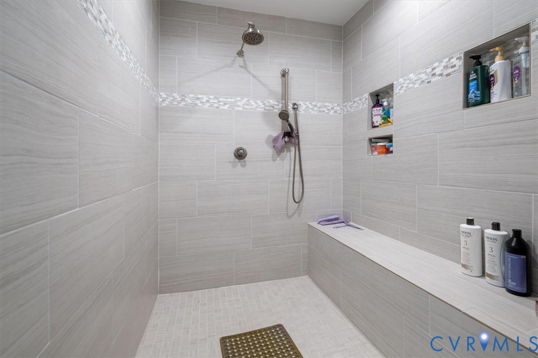 9820 Beaver Bridge Road Chesterfield, VA 23838 - Photo 40 of 54 Shower enclosure featuring light grey tile walls,