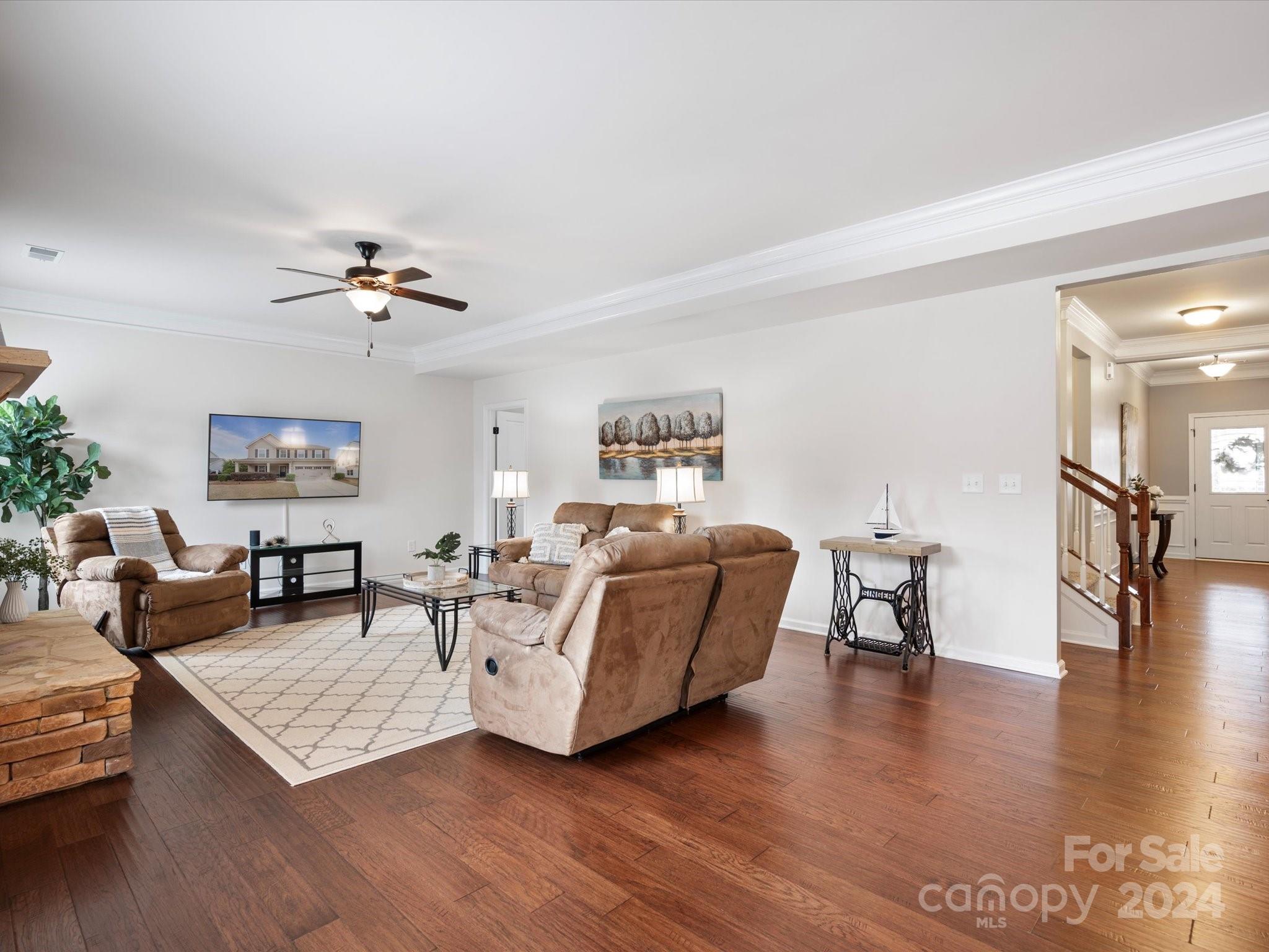 1617 Ridgehaven Road Waxhaw, NC 28173 - Photo 20 of 47 a living room with furniture and wooden floor