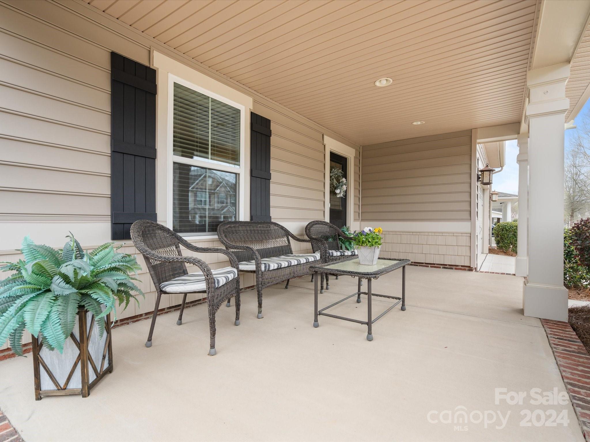 1617 Ridgehaven Road Waxhaw, NC 28173 - Photo 2 of 47 a view of a house with patio and a garden