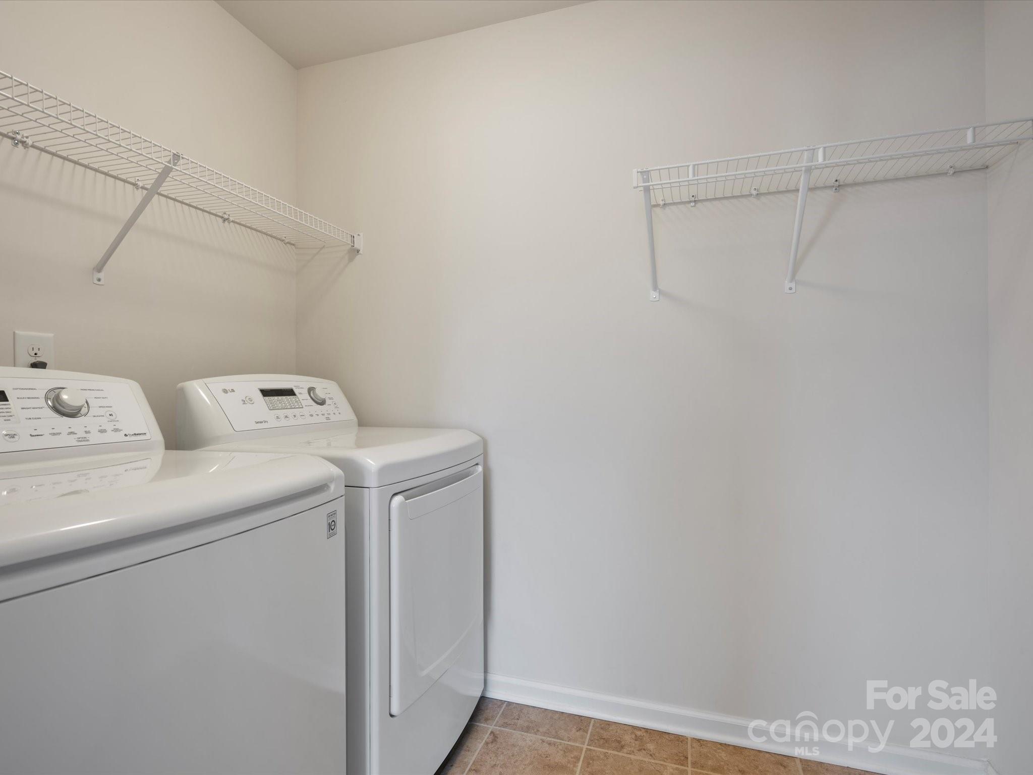 1617 Ridgehaven Road Waxhaw, NC 28173 - Photo 38 of 47 a utility room with dryer and washer