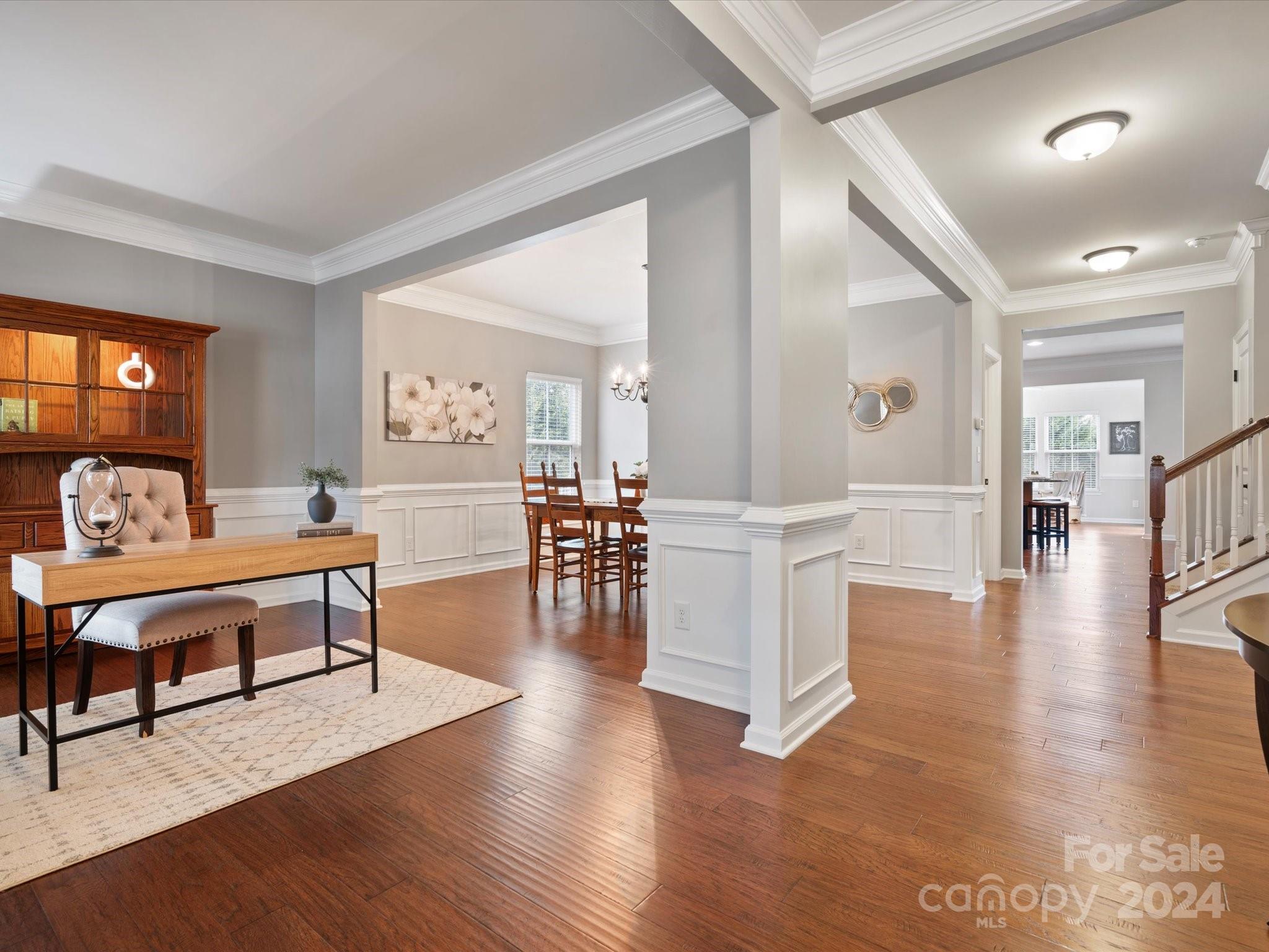 1617 Ridgehaven Road Waxhaw, NC 28173 - Photo 4 of 47 a living room with furniture and a wooden floor