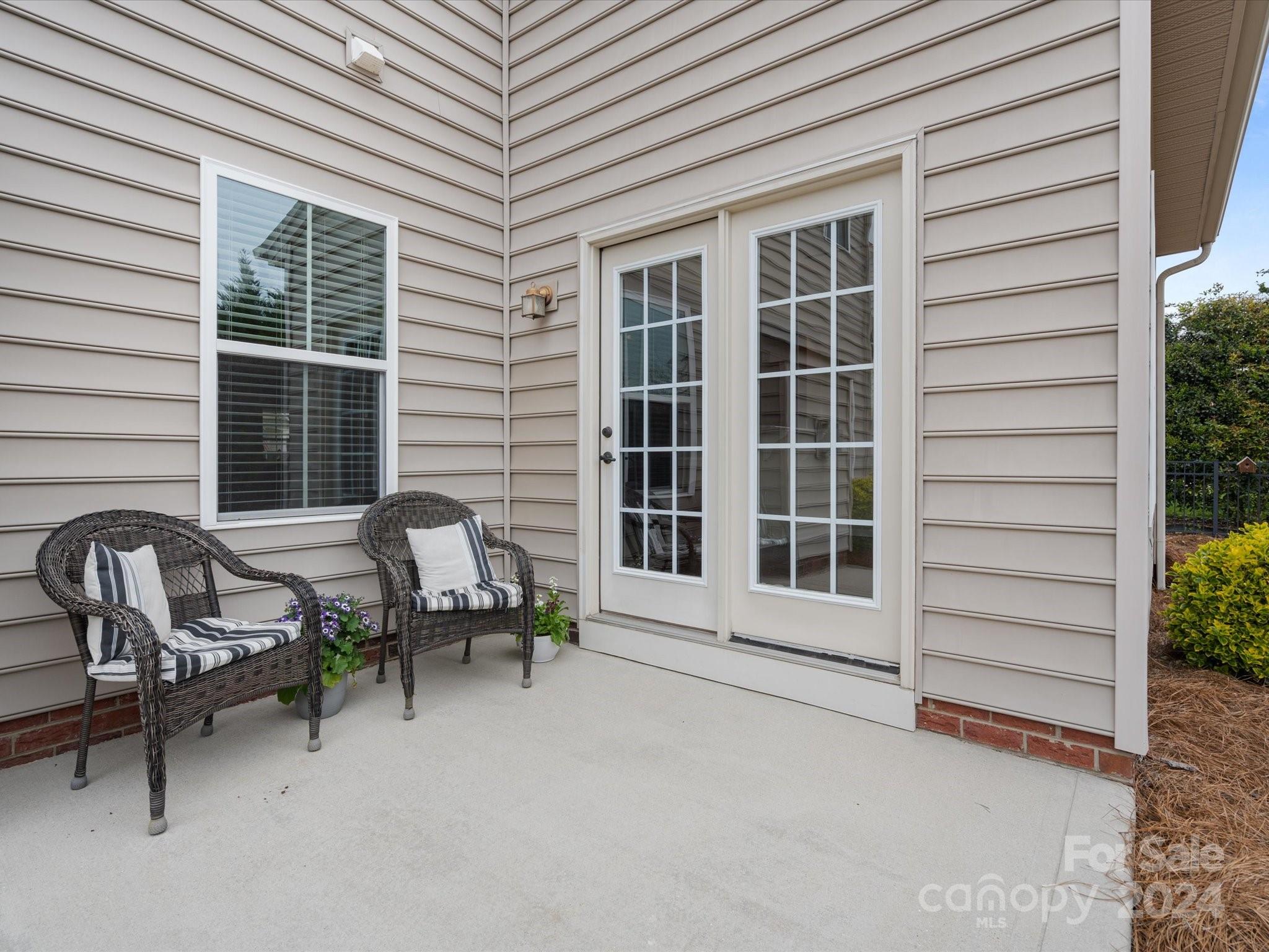 1617 Ridgehaven Road Waxhaw, NC 28173 - Photo 41 of 47 a backyard of a house with outdoor seating