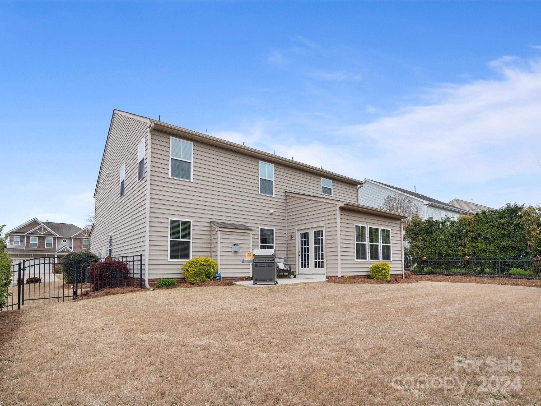 1617 Ridgehaven Road Waxhaw, NC 28173 - Photo 43 of 47 a view of a house with a backyard