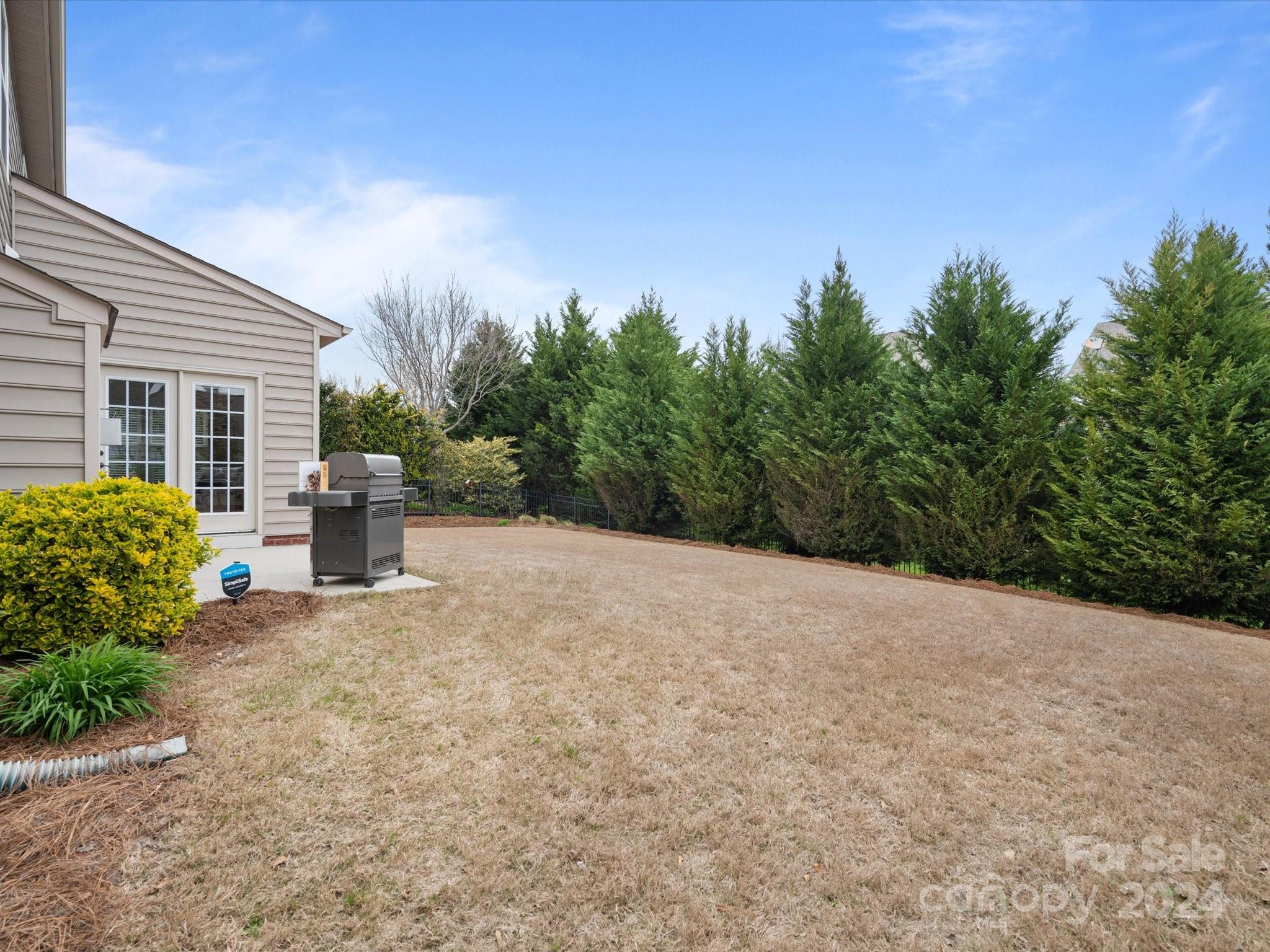 1617 Ridgehaven Road Waxhaw, NC 28173 - Photo 44 of 47 a view of a house with backyard and garden