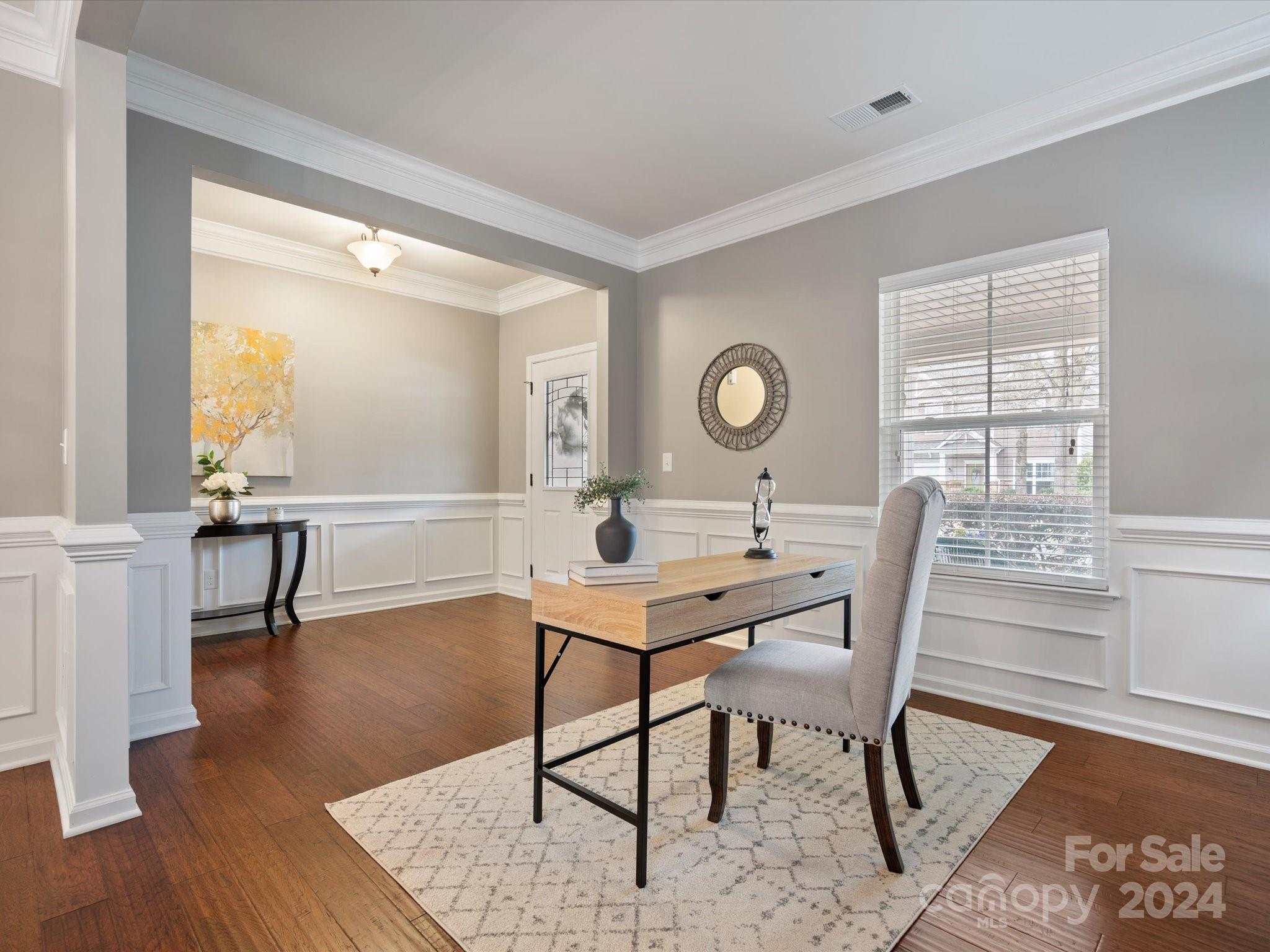 1617 Ridgehaven Road Waxhaw, NC 28173 - Photo 5 of 47 a view of a dining room with furniture and a large window