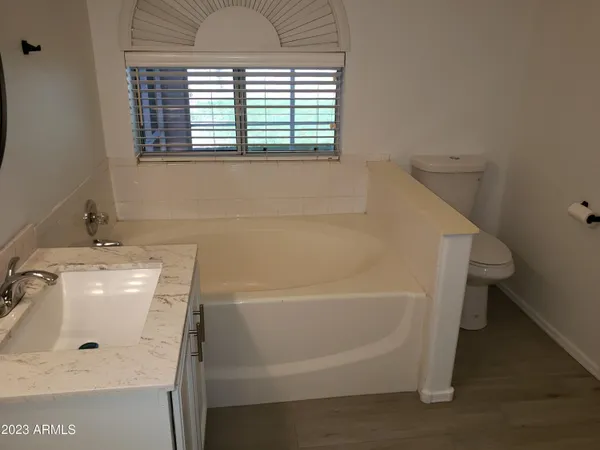 a bathroom with a sink and a bathtub