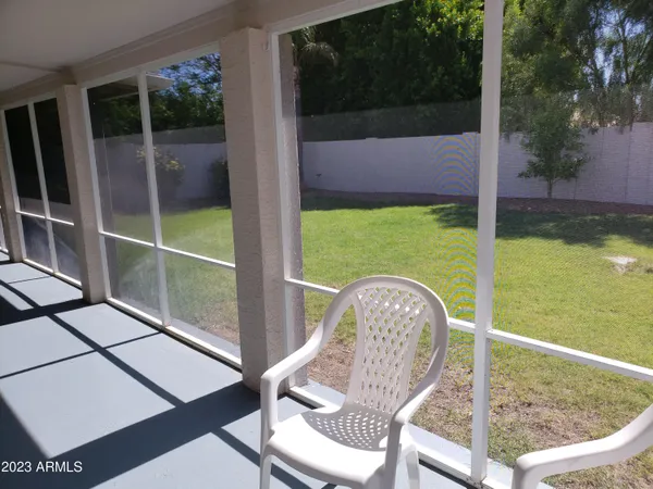 a view of balcony with a potted plant