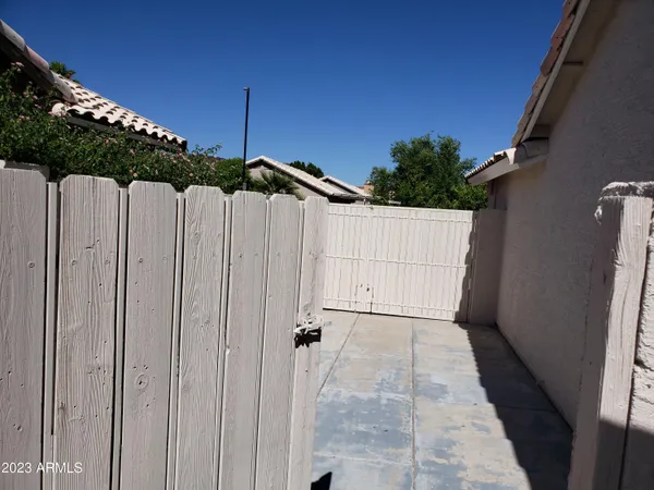 a view of a house with a tree