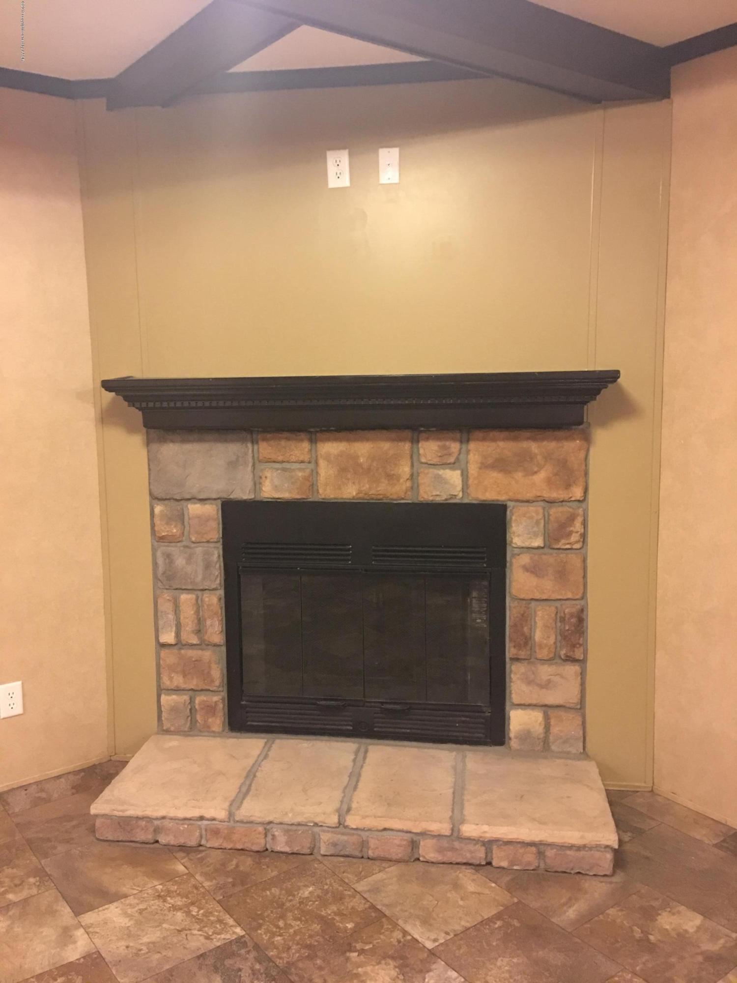 6701 Susie Road Amarillo, TX 79118 - Photo 5 of 30 Fireplace in Den