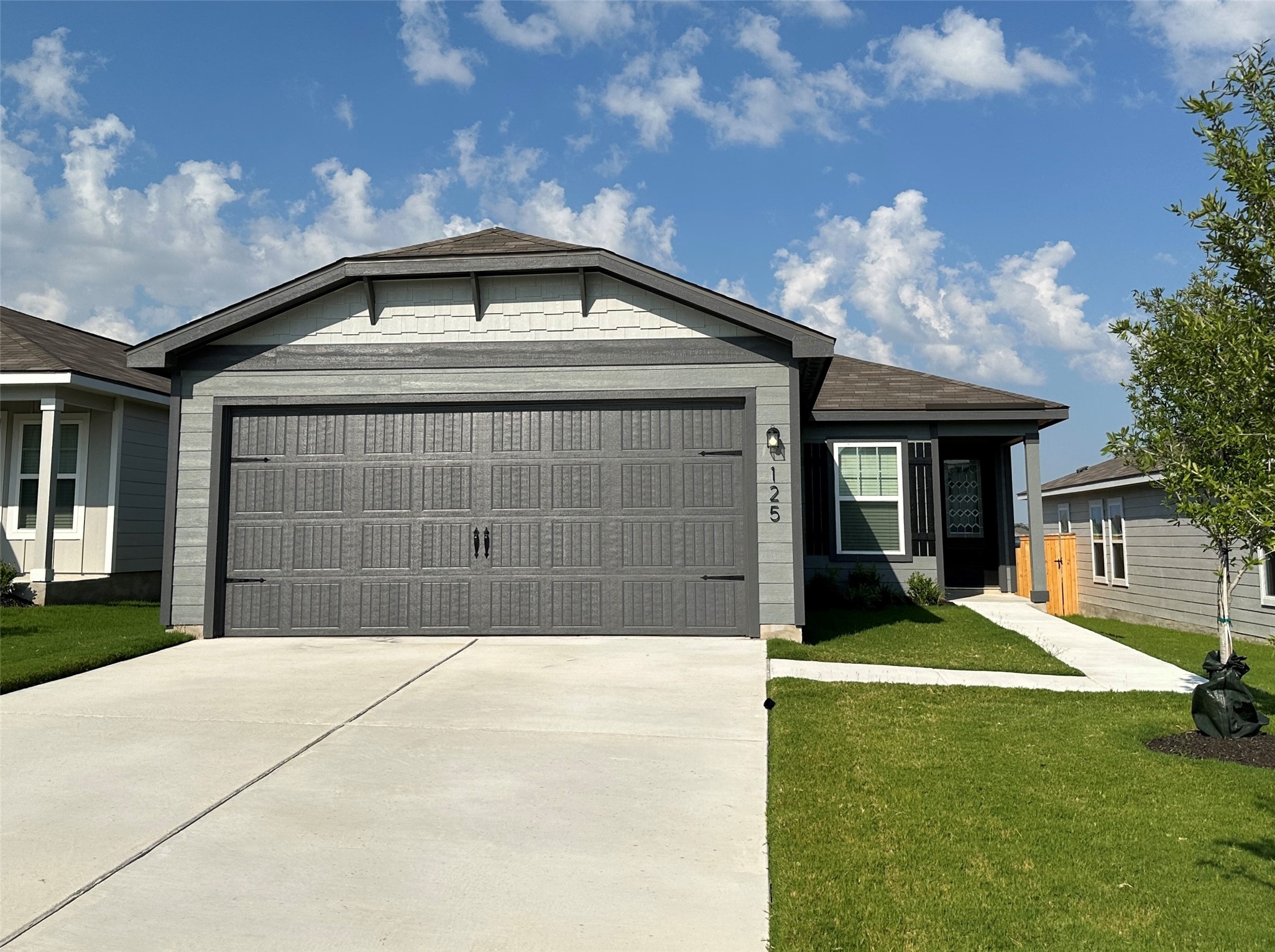 a front view of house with yard