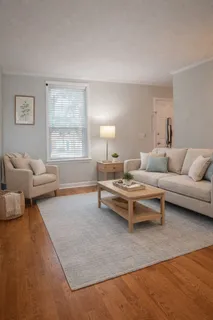 a living room with furniture and a couch