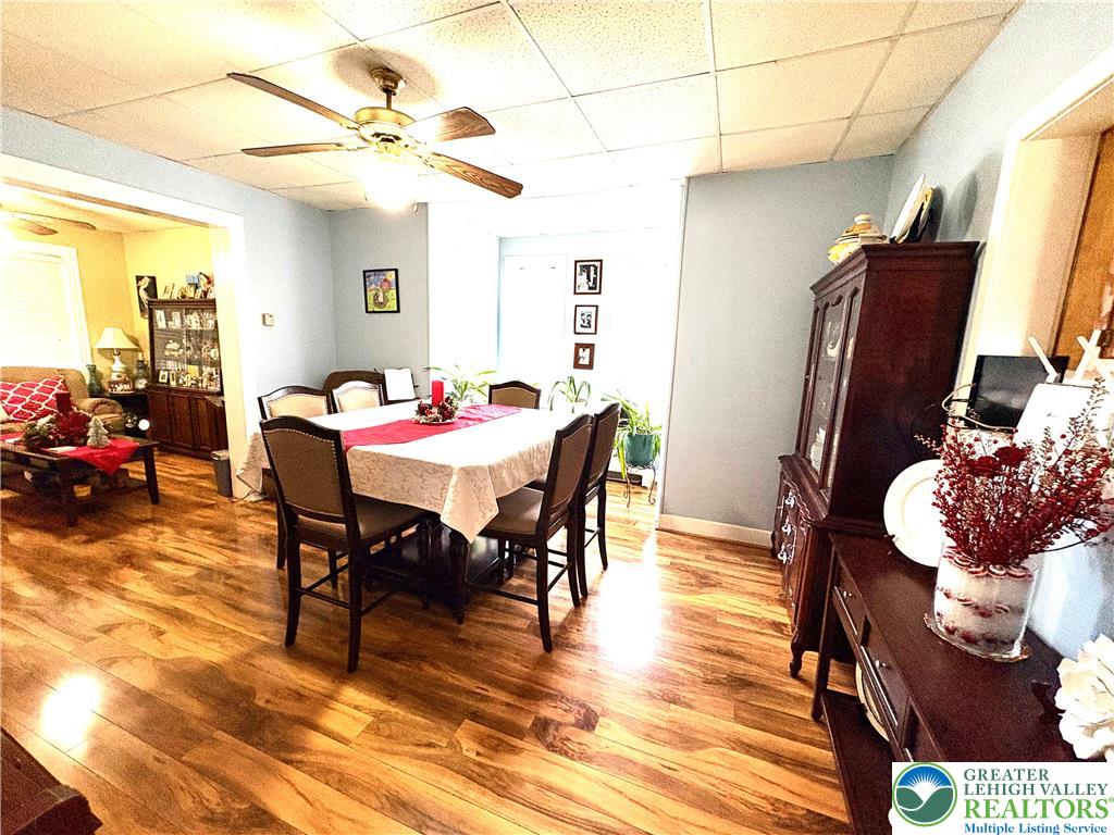 346 Messinger Street Bangor, PA 18013 - Photo 11 of 26 a view of a dining room with furniture a chandelier and wooden floor