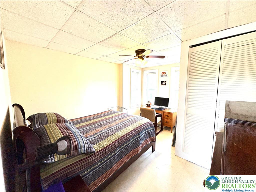 346 Messinger Street Bangor, PA 18013 - Photo 20 of 26 a bedroom with a bed and wooden floor