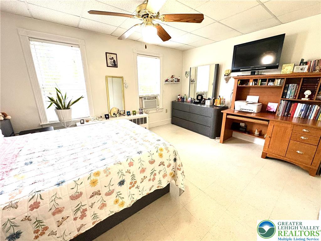 346 Messinger Street Bangor, PA 18013 - Photo 21 of 26 a bedroom with a bed and flat screen tv