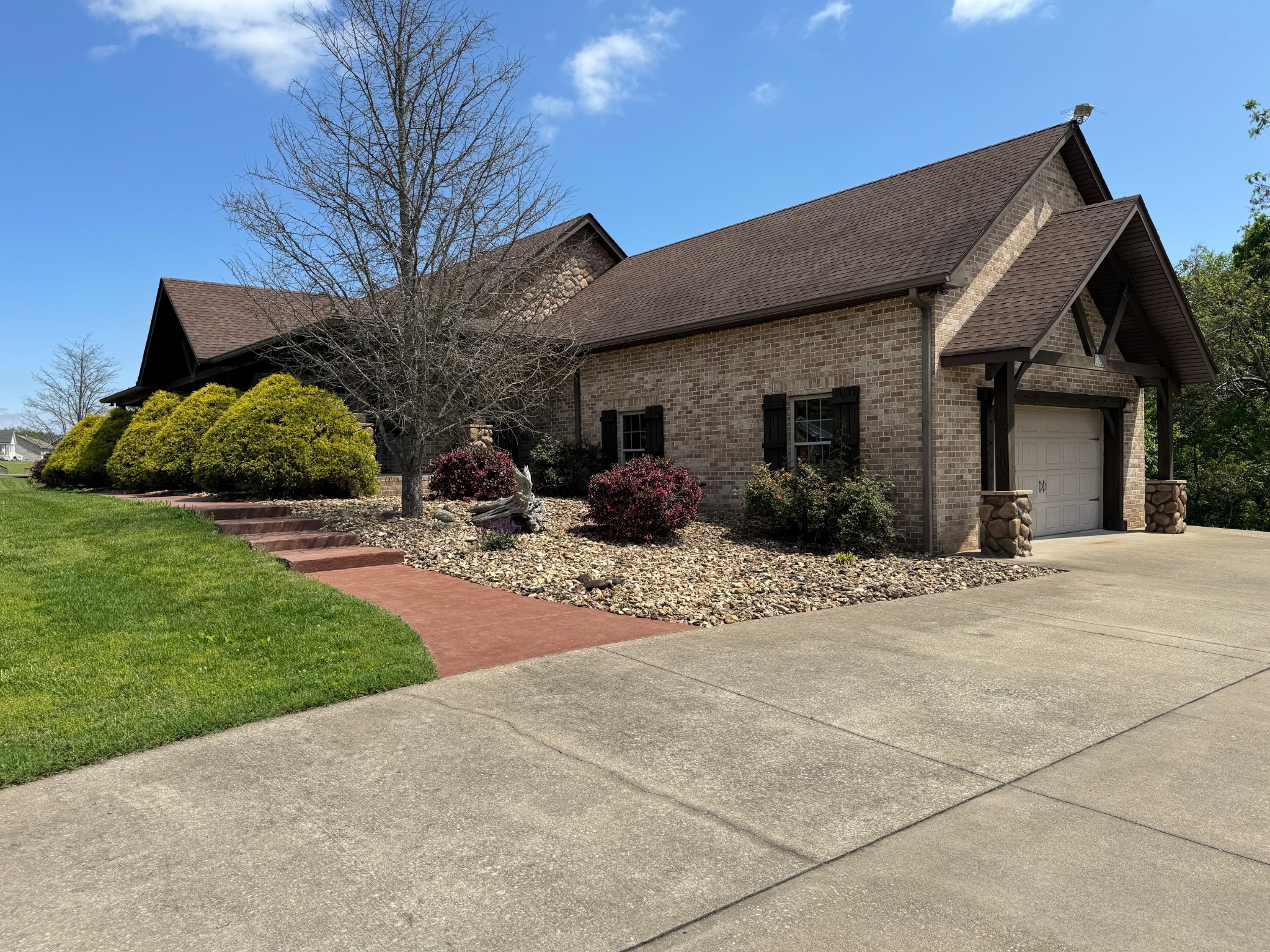 375 Autumn Ridge Lane Lafayette, TN 37083 - Photo 1 of 43 a view of a house with backyard and trees