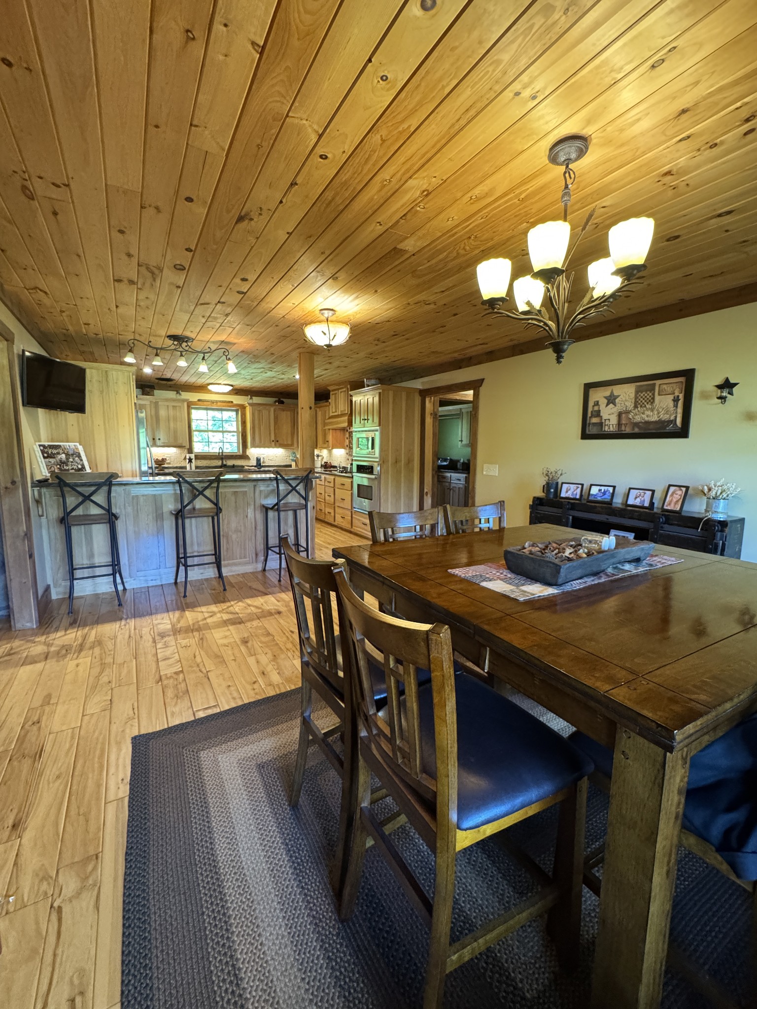 375 Autumn Ridge Lane Lafayette, TN 37083 - Photo 14 of 43 a view of a dining room with furniture and chandelier