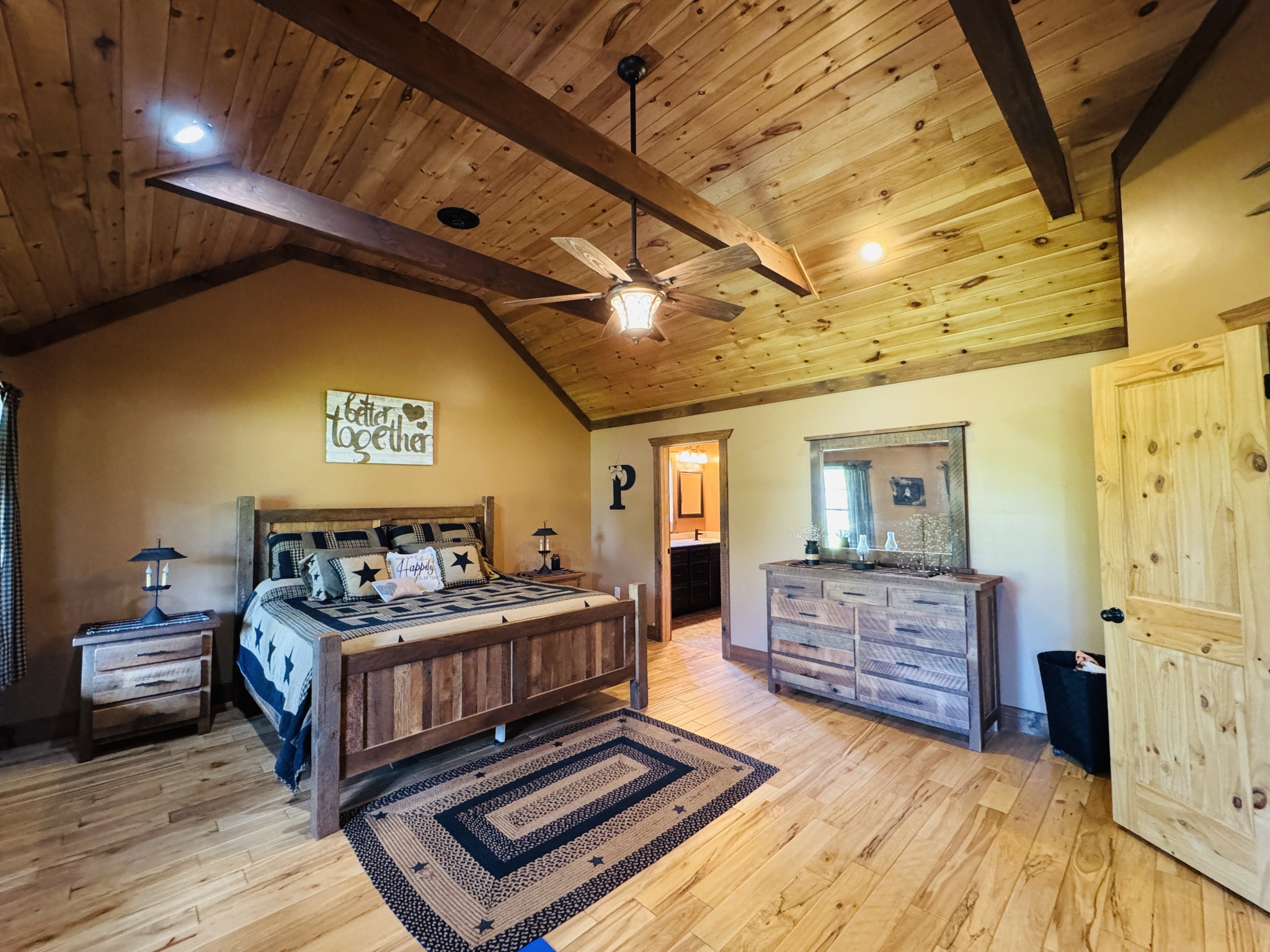 375 Autumn Ridge Lane Lafayette, TN 37083 - Photo 15 of 43 a bedroom with a bed and wooden floor