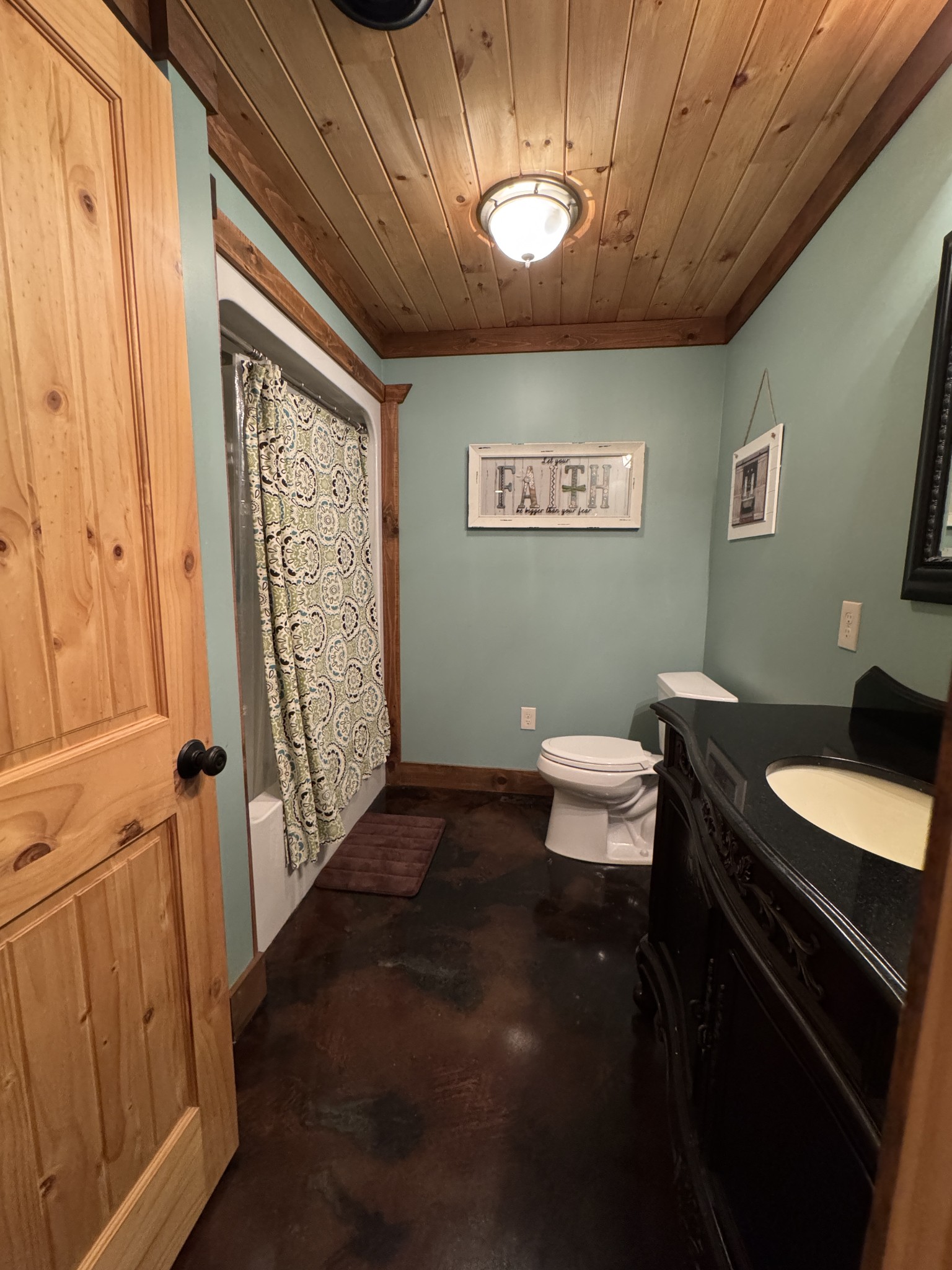 375 Autumn Ridge Lane Lafayette, TN 37083 - Photo 35 of 43 a bathroom with a toilet sink and mirror