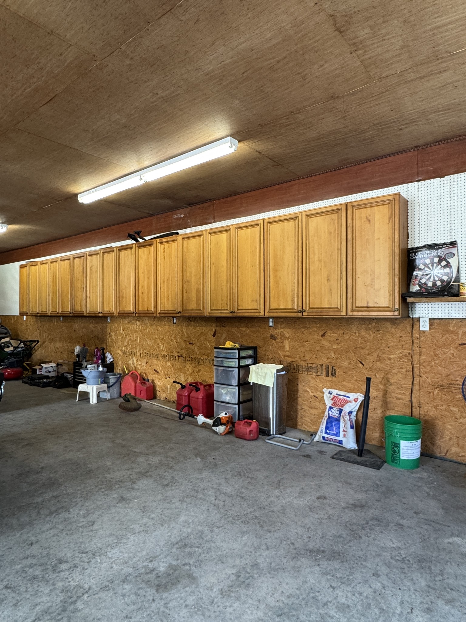 375 Autumn Ridge Lane Lafayette, TN 37083 - Photo 39 of 43 a room with lot of flower plants and a large tree