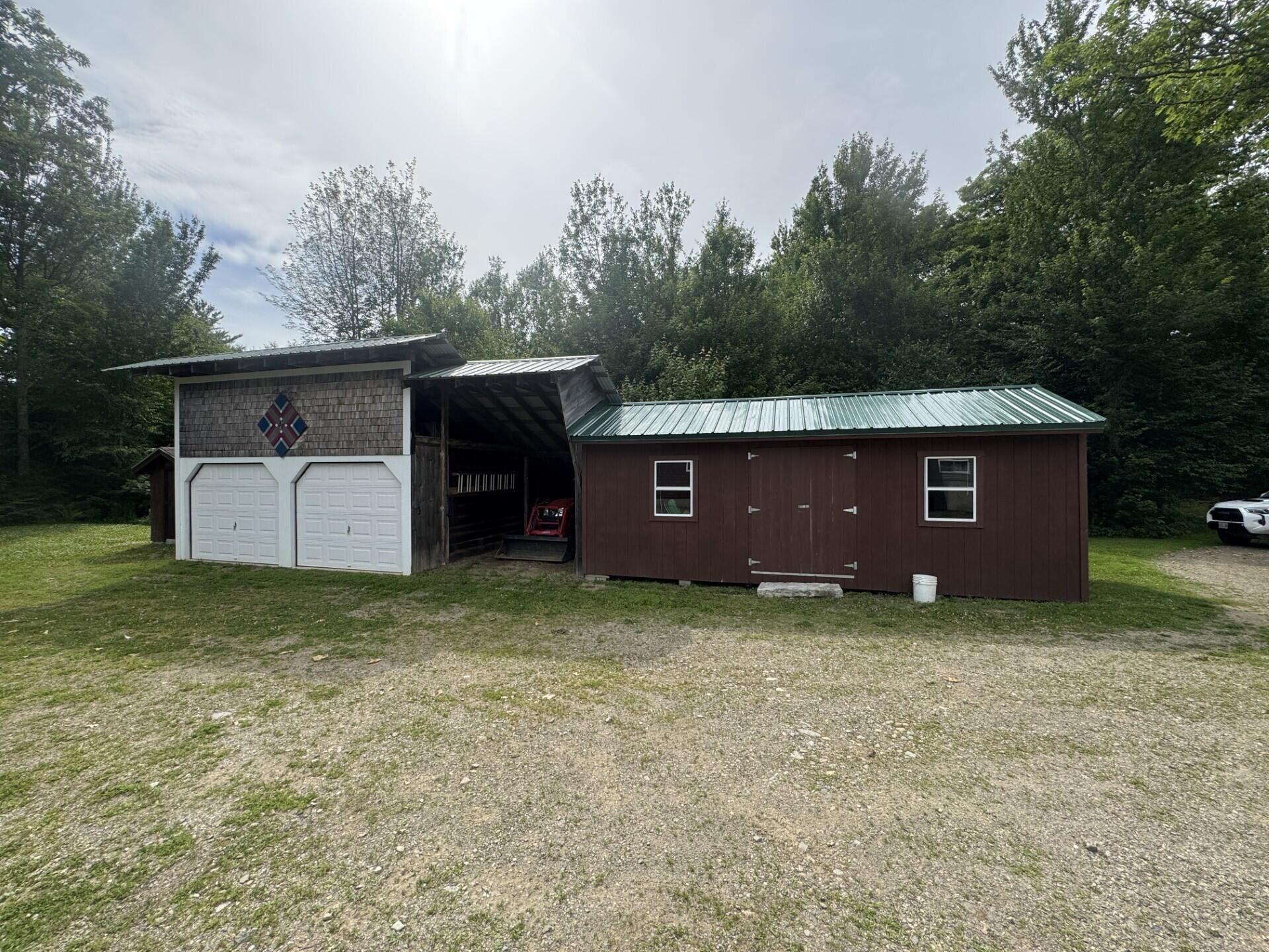 71 Garland Road Dixmont, ME 04932 - Photo 4 of 23 Detached garage with storage