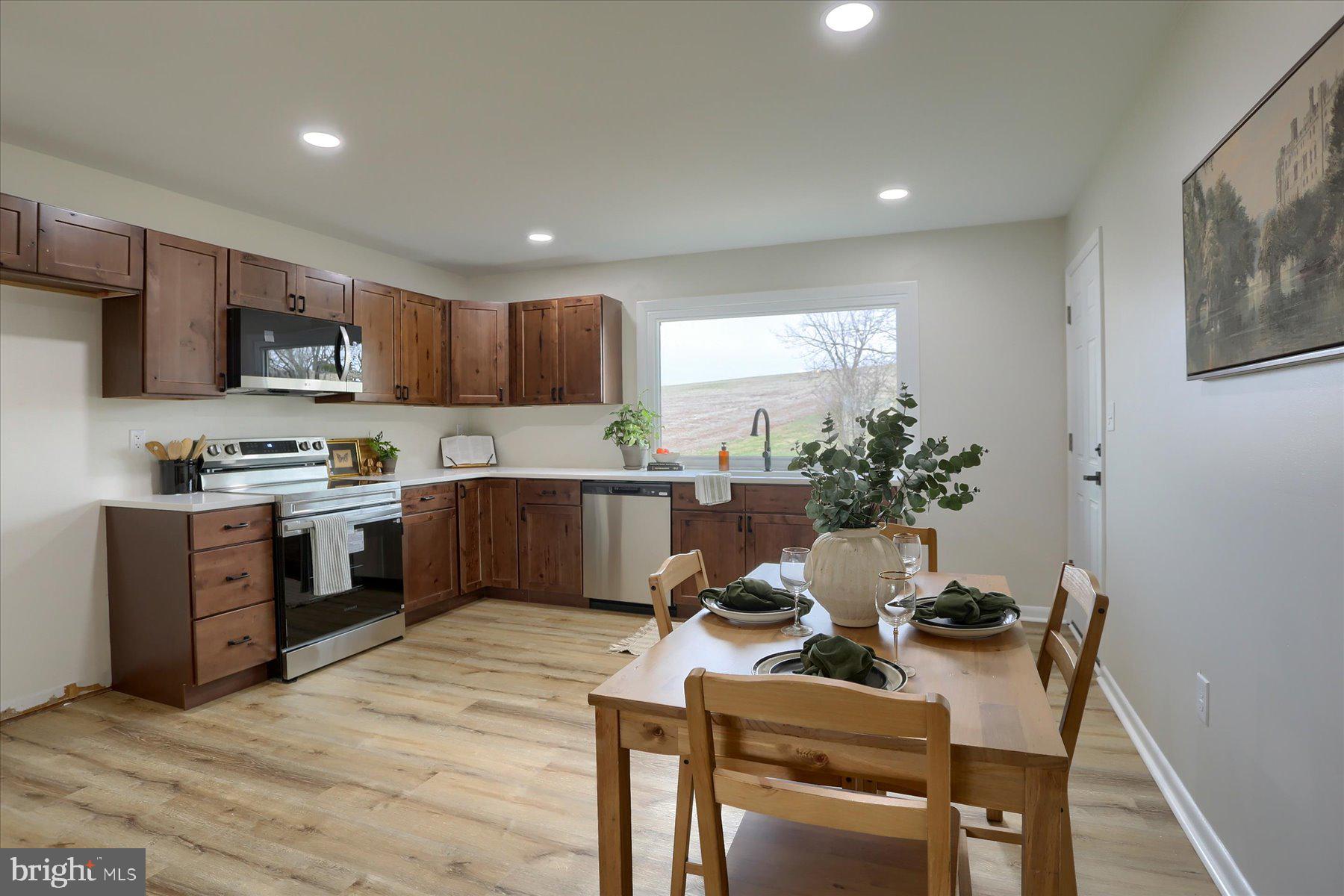 1339 Berrysburg Road Millersburg, PA 17061 - Photo 11 of 42 a kitchen with a table and chairs in it