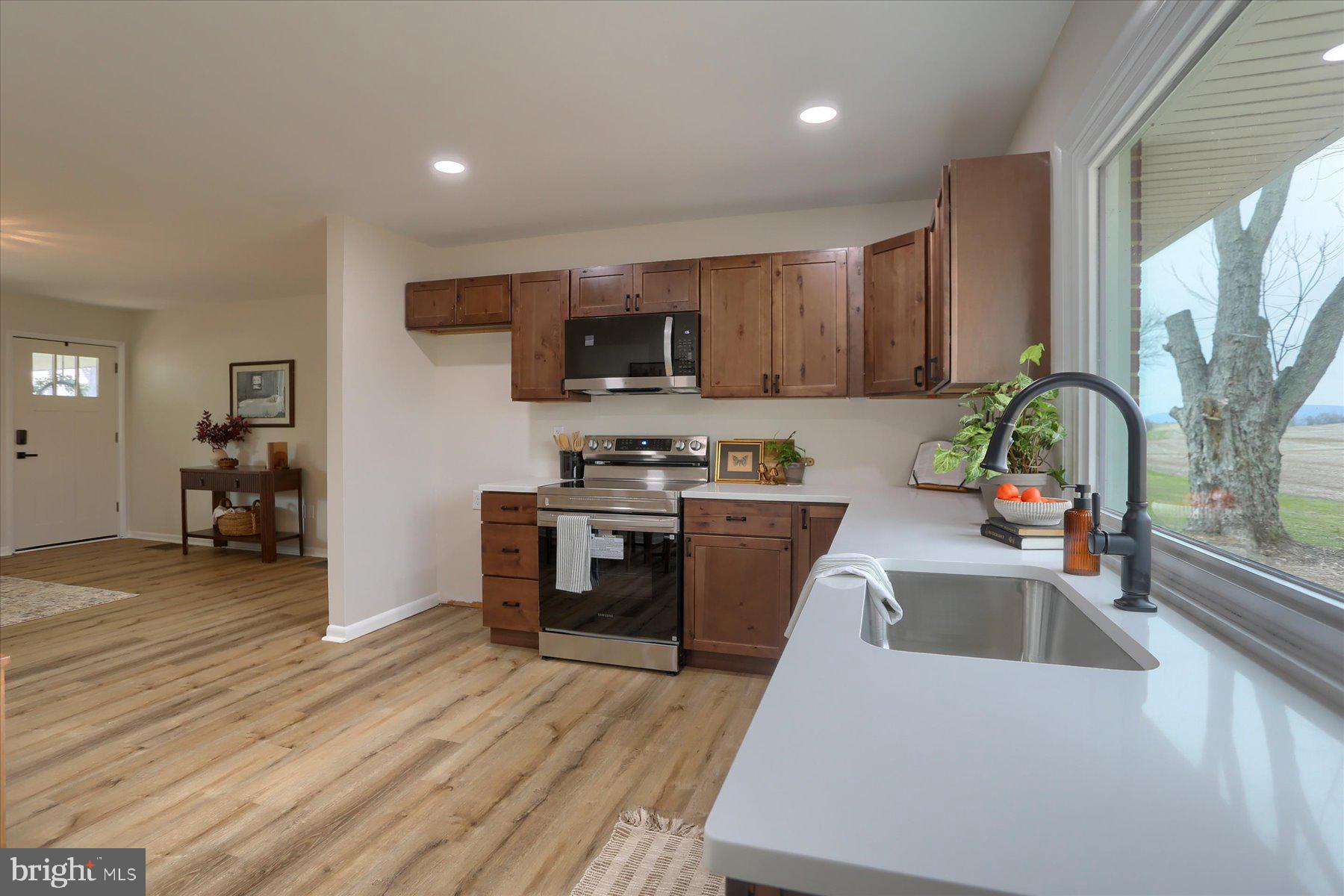 1339 Berrysburg Road Millersburg, PA 17061 - Photo 13 of 42 a kitchen with a sink a counter top space and appliances