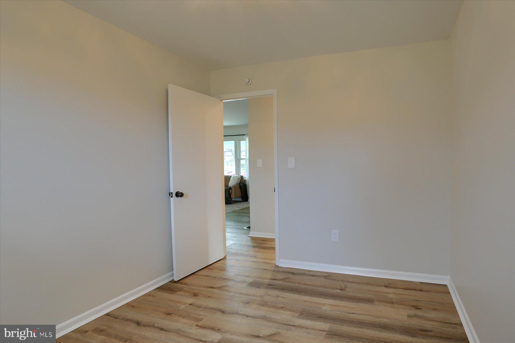 1339 Berrysburg Road Millersburg, PA 17061 - Photo 19 of 42 a view of an empty room with wooden floor