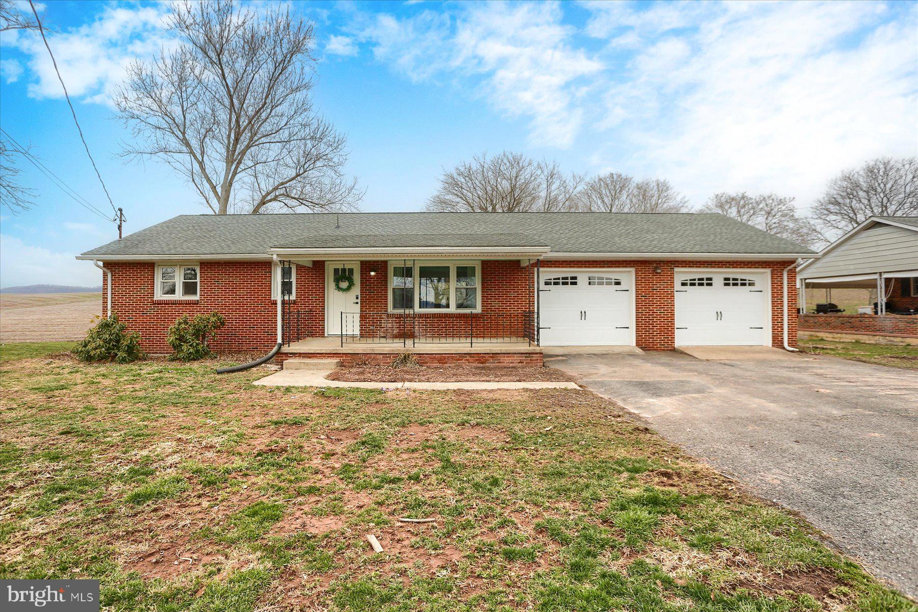 1339 Berrysburg Road Millersburg, PA 17061 - Photo 2 of 42 a view of a yard in front of a house with large tree