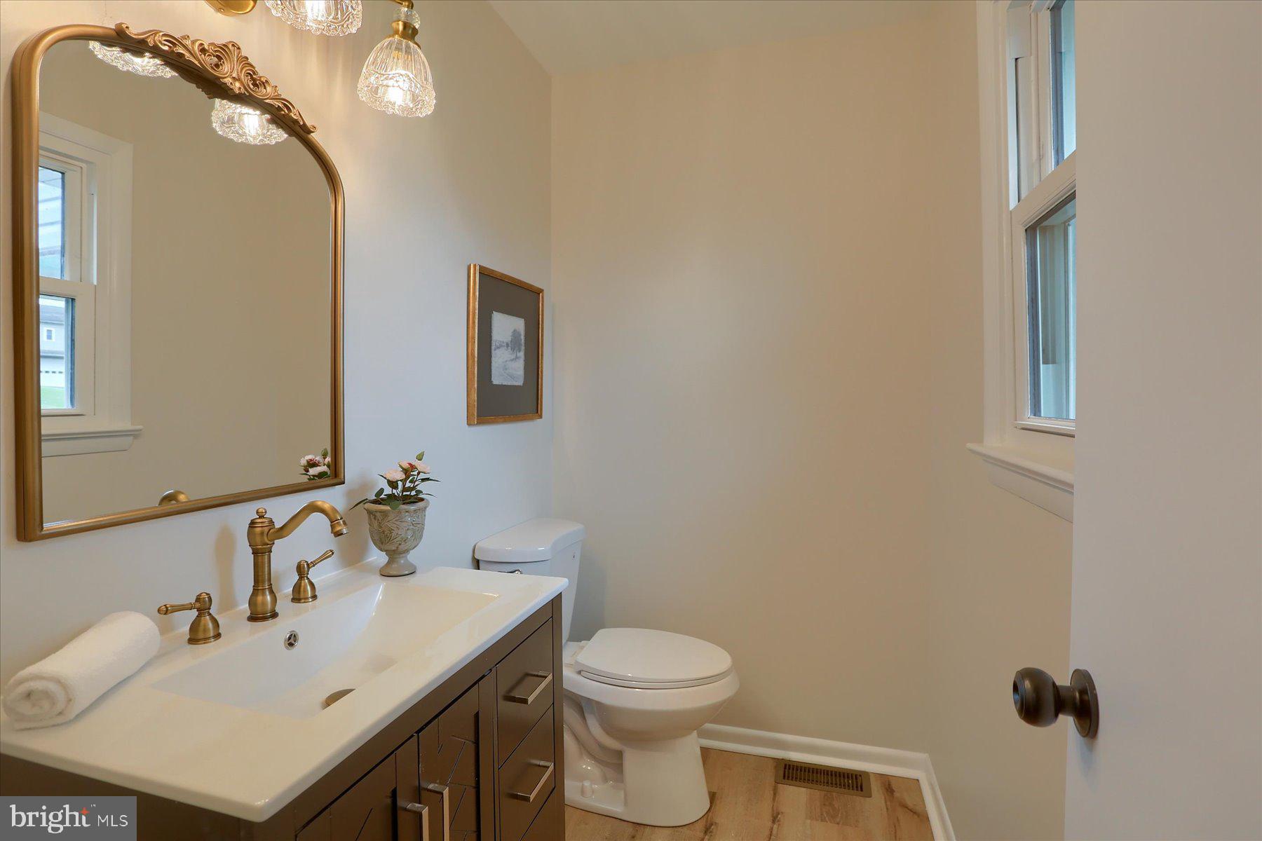 1339 Berrysburg Road Millersburg, PA 17061 - Photo 27 of 42 a bathroom with a sink mirror and toilet
