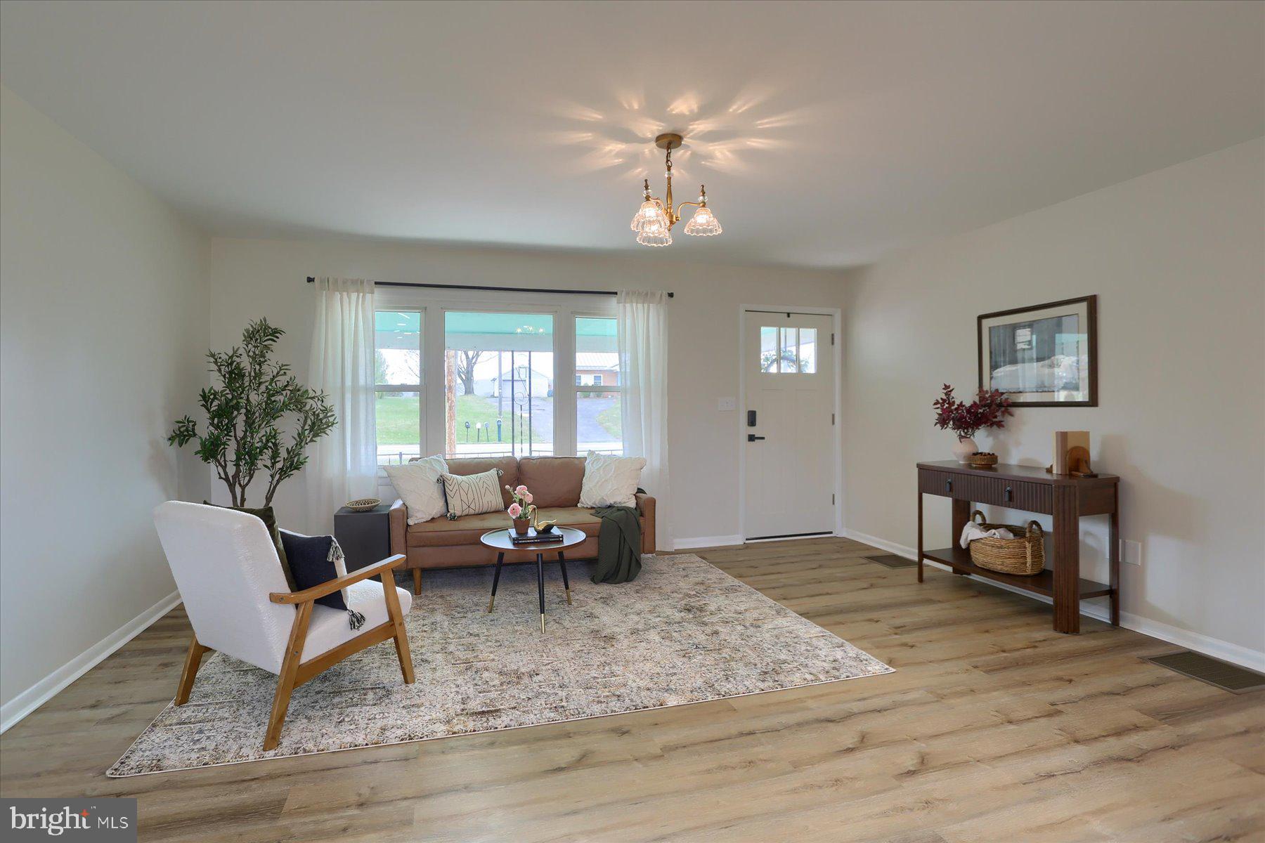 1339 Berrysburg Road Millersburg, PA 17061 - Photo 9 of 42 a living room with furniture and a potted plant
