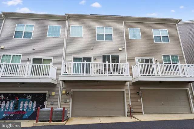 a front view of building with lot of windows