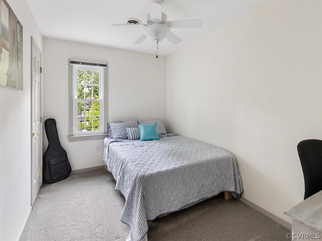 1013 Ashbrook Landing Road Midlothian, VA 23114 - Photo 17 of 30 a bedroom with a bed chair and a window