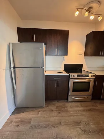 a utility room with washer and dryer