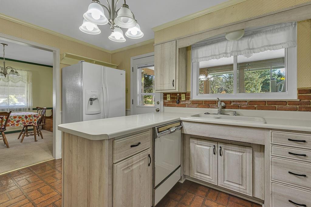4178 South R 1022 New Brighton, PA 15066 - Photo 11 of 33 a kitchen with a sink cabinets and window