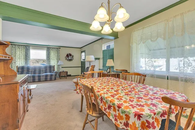 a view of a livingroom with furniture and a couch