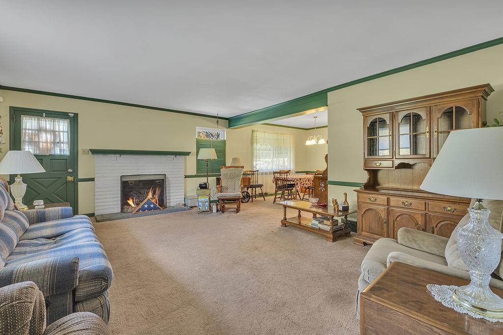 4178 South R 1022 New Brighton, PA 15066 - Photo 16 of 33 a living room with furniture and a fireplace
